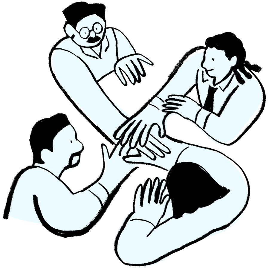 Dört kişi, sağ ellerini birbirinin elinin üzerine koymuşlar.